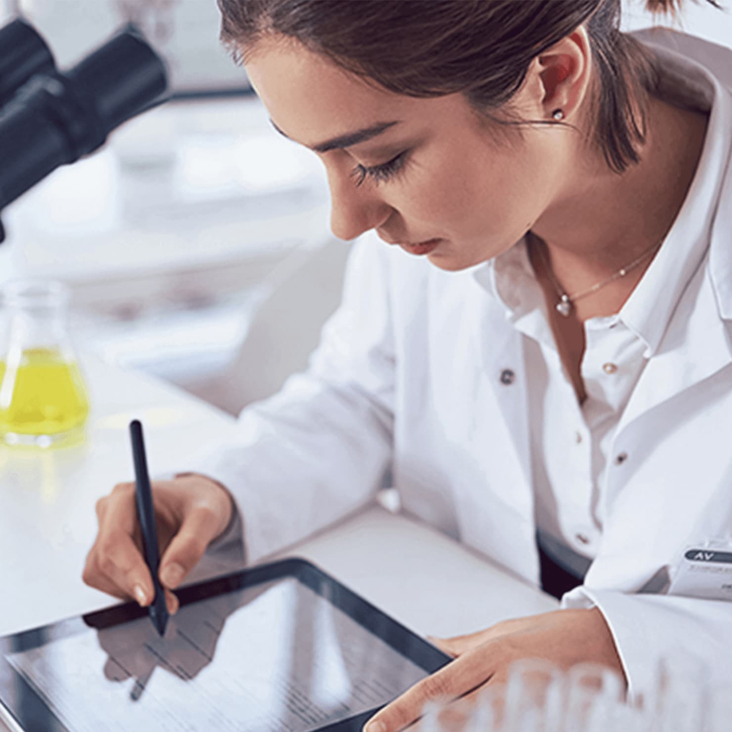 Pharmacist working on a digital tablet